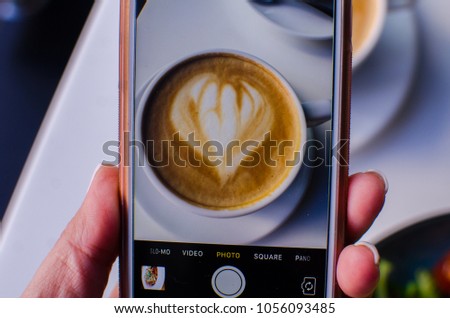 
photo of a cup of coffee on the phone