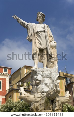 Statue of Christopher Columbus in town center pointing west in village of Santa Margarita, the Italian Riviera, Italy, Europe