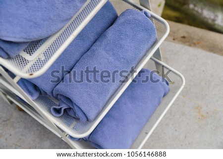 Selective focus to rolled blue towels - Relax time