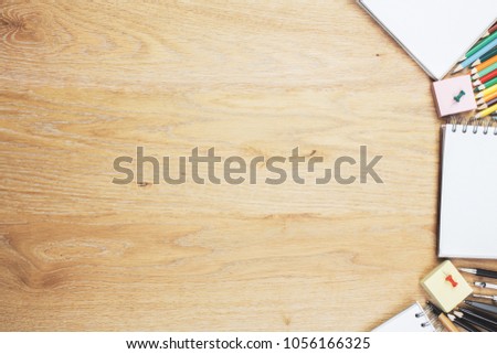 Top view of modern wooden office table with supplies and copy space. Design and work place concept. Mock up 