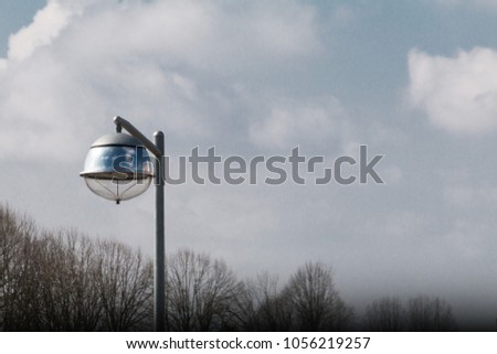 Street lamp made of glass and chrome