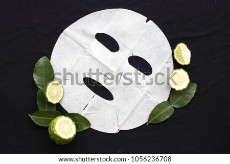natural sheet mask for skin face from herbal kaffir lime on background black