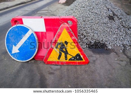 Road construction site and road works traffic sign.
