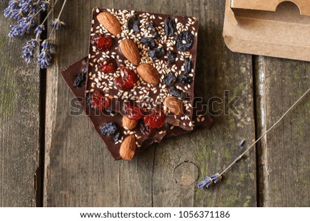 chocolate with nuts and dried fruits (organic sweets)
 