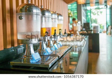 Selective focus of buffe juices in glass jar at luxury resort
