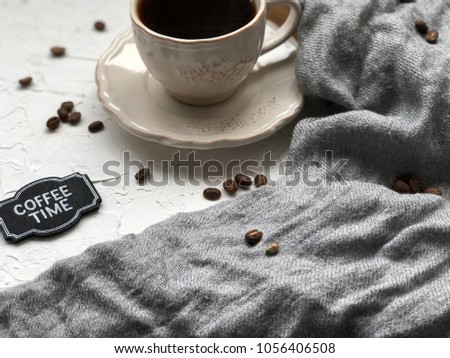 coffee time chalkboard with white cup and beans on white background 