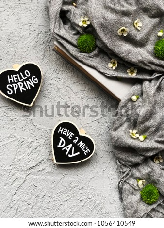 have a nice day spring chalkboard on grey background. hello spring concept wallpaper. spring morning flatlay