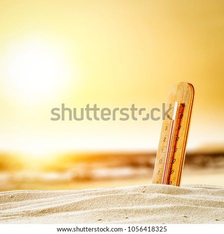 Summer thermometer on beach and free space for your decoration. 