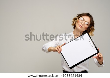   business woman with a folder-tablet, documents, work                             