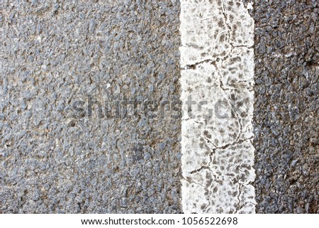 Asphalt lined road surface background with copy space for design