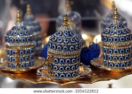 Turk for coffee. Traditional handmade sets. Teapot and cups for coffee and tea. Ancient, Oriental silver metallic set. Turkish national dishes. Dishes in Turkey. Close up