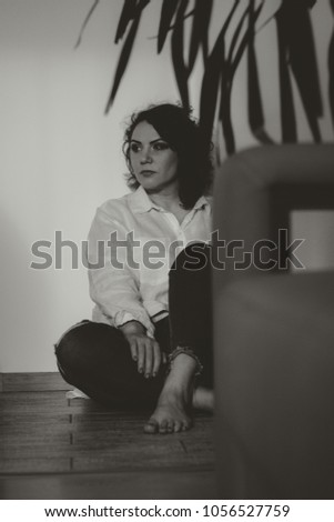 Plus size woman in shirt, monochrome photo with grain. vintage picture low key