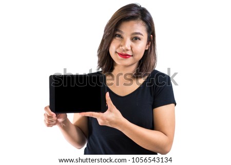Young asian woman presenting blank screen tablet, with joy and cheerful emotion, for mobile or tablet application advertisement, isolated, white background