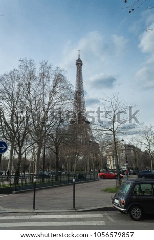 Eiffel tower with vehicle at the bottom, Paris, France