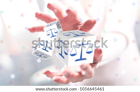 Law concept between hands of a woman in background