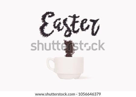 Word Easter from ground coffee with a cup 