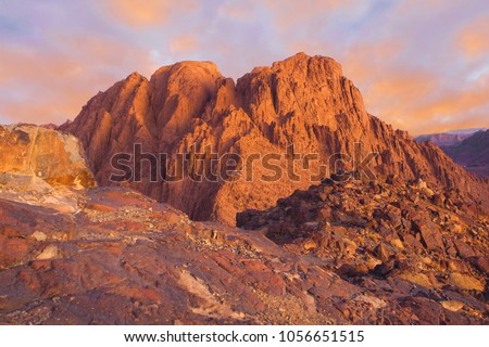 Amazing Sunrise at Sinai Mountain, Mount Moses with a Bedouin, Beautiful view from the mountain	 Royalty-Free Stock Photo #1056651515