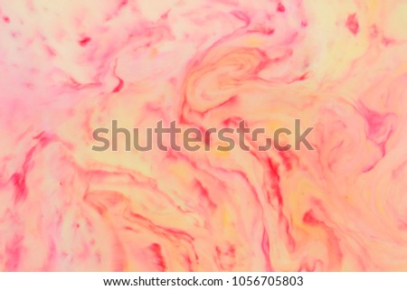 Abstract red yellow background, pastel pattern, yellow and red colors in liquid, stains on milk, pop art, minimalistic background, blank for designer