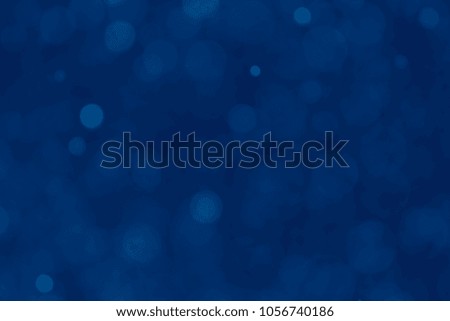 Abstract Blue bokeh background. Blurred bright light. Circular points. Colorful. Defocused background.
