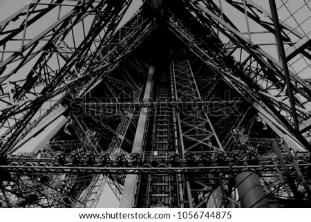 Line row in Paris. Architecture inside the eiffel tower. Black and white photo with so many details. I am so proud on this picture. She is different.