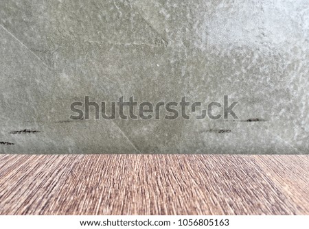 Bare plaster concrete wall with wood floor texture