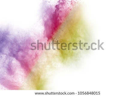 Explosion of colored powder on white background ,Freeze motion of color powder exploding/throwing color powder, multicolored glitter texture.