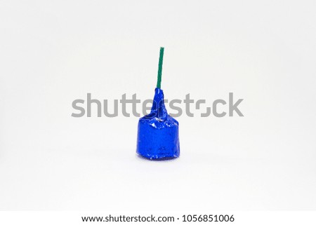 Blue firecracker for funny in Loy Kratong festival,  isolated on white background.
