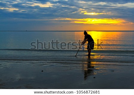 Sunrise with background in beach Tap Skea and boat at  Phrachaup Khirikhan Province Thailand