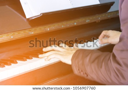 Man playing piano in the church.