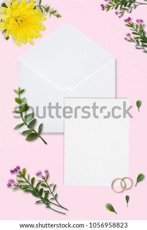 Styled stock photo. Feminine wedding desktop mockup. White roses, satin ribbon, beads on delicate beige background. Copy space. Top view. Picture for blog