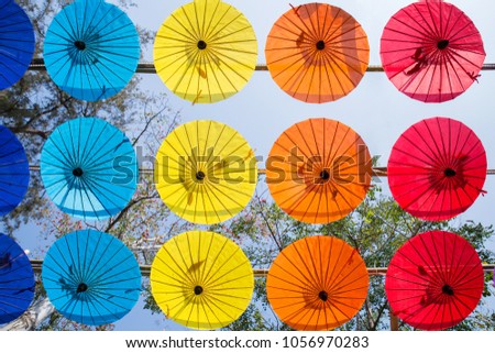 Colorful umbrellas in the sky.Colorful umbrellas background.