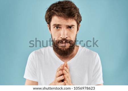  sad man with beard looking at camera, portrait                              