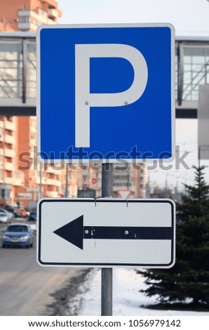 Parking left. Traffic sign with the letter P and the arrows to the left