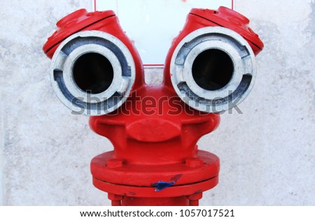 Israel, Tel Aviv. Fire hydrant, similar to the head and face of a funny cartoon character.
