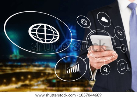 Businessman using smartphone with infographic icon