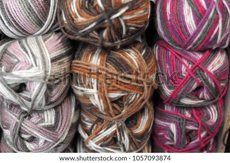 Colorful balls of wool, close up background