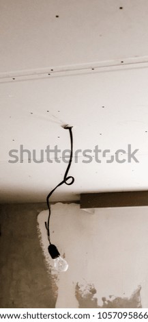 light bulb on drywall