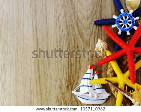 top view of nautical stlye home decor with space on wooden background