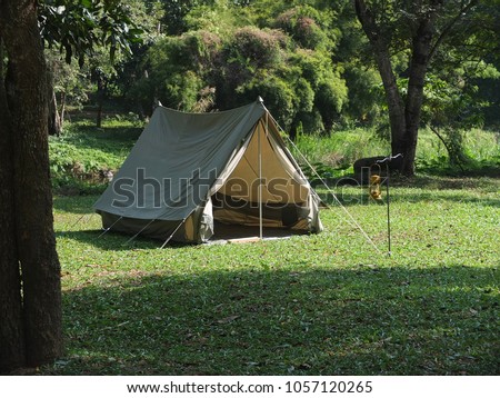 Vintage japan canvas tent for hiking Royalty-Free Stock Photo #1057120265