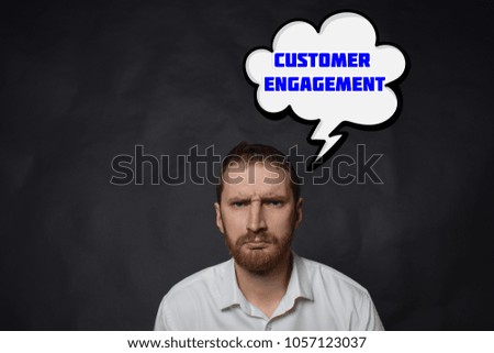 Above the businessman hangs a cloud with the inscription:CUSTOMER ENGAGEMENT