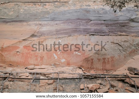 4,000 years Pre-history painting under the cliff at Pha Taem, Ubon Ratchathani, Thailand.