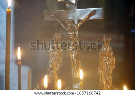 Burning candles in the Church .