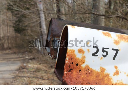 Old rusty mailboxes on rural country road