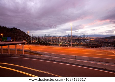 Freeway and panoramic view of western side of the city, Vitacura, Santiago, Chile