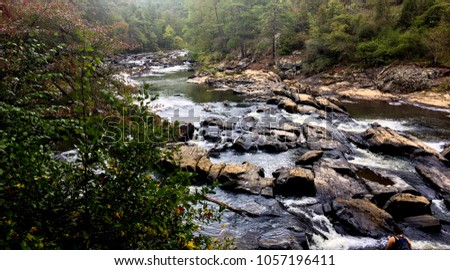 River flowing at Sweetwater Creek State Park in Georgia. Royalty-Free Stock Photo #1057196411