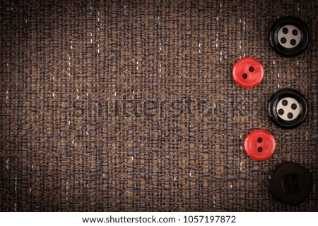 Fabric texture with buttons. Abstract background, empty template. Top view.