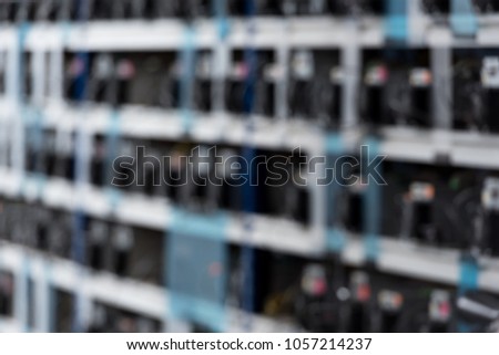 blurred shot of cryptocurrency mining farm