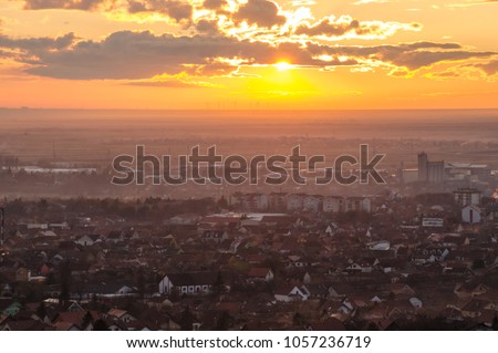 Cityscape in a setting sun