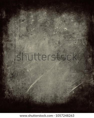 Dark scratched horror grunge background with black frame and space for your text or picture