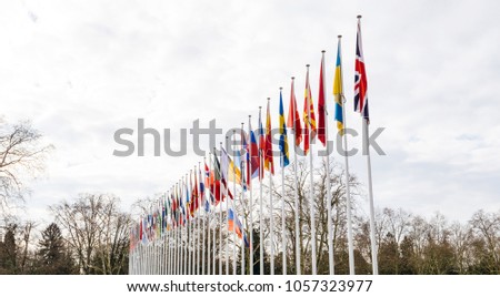 Wide shoot of flag of Russia flying half-mast at Council of Europe as a tribute and mourning of victims of fire at Zimnyaya Vishnya Winter Cherry shopping centre Kemerovo.